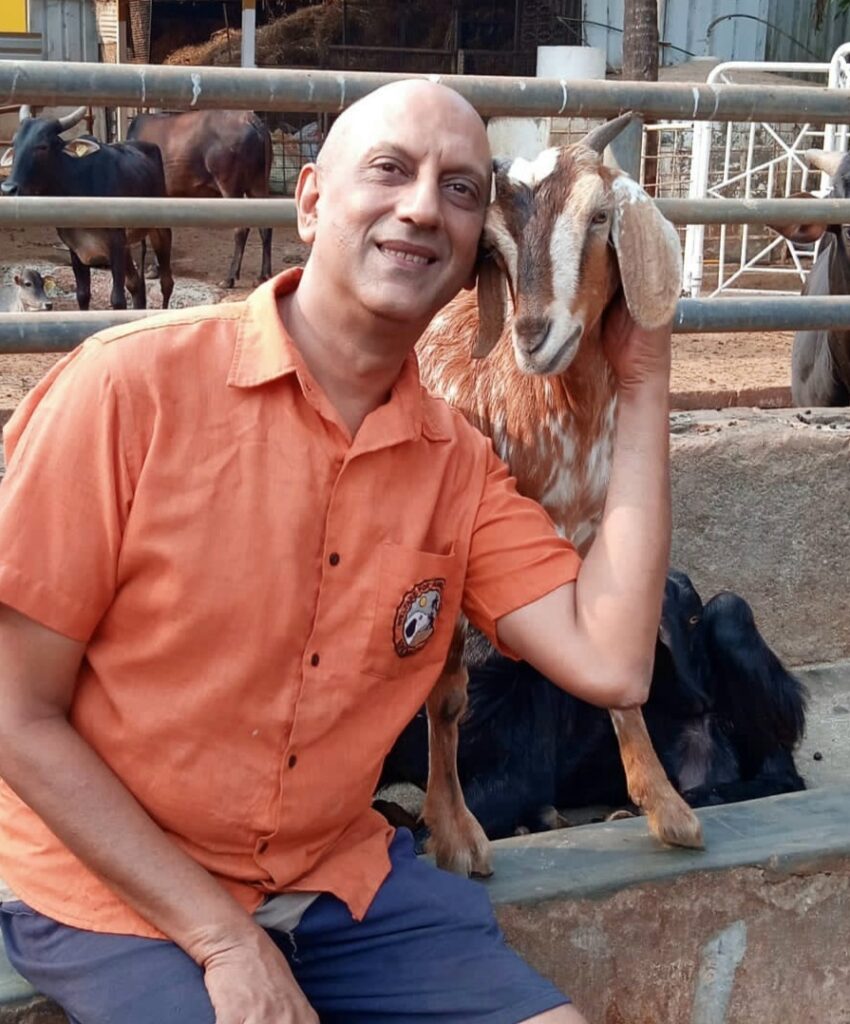 Atul Sarin with a goat