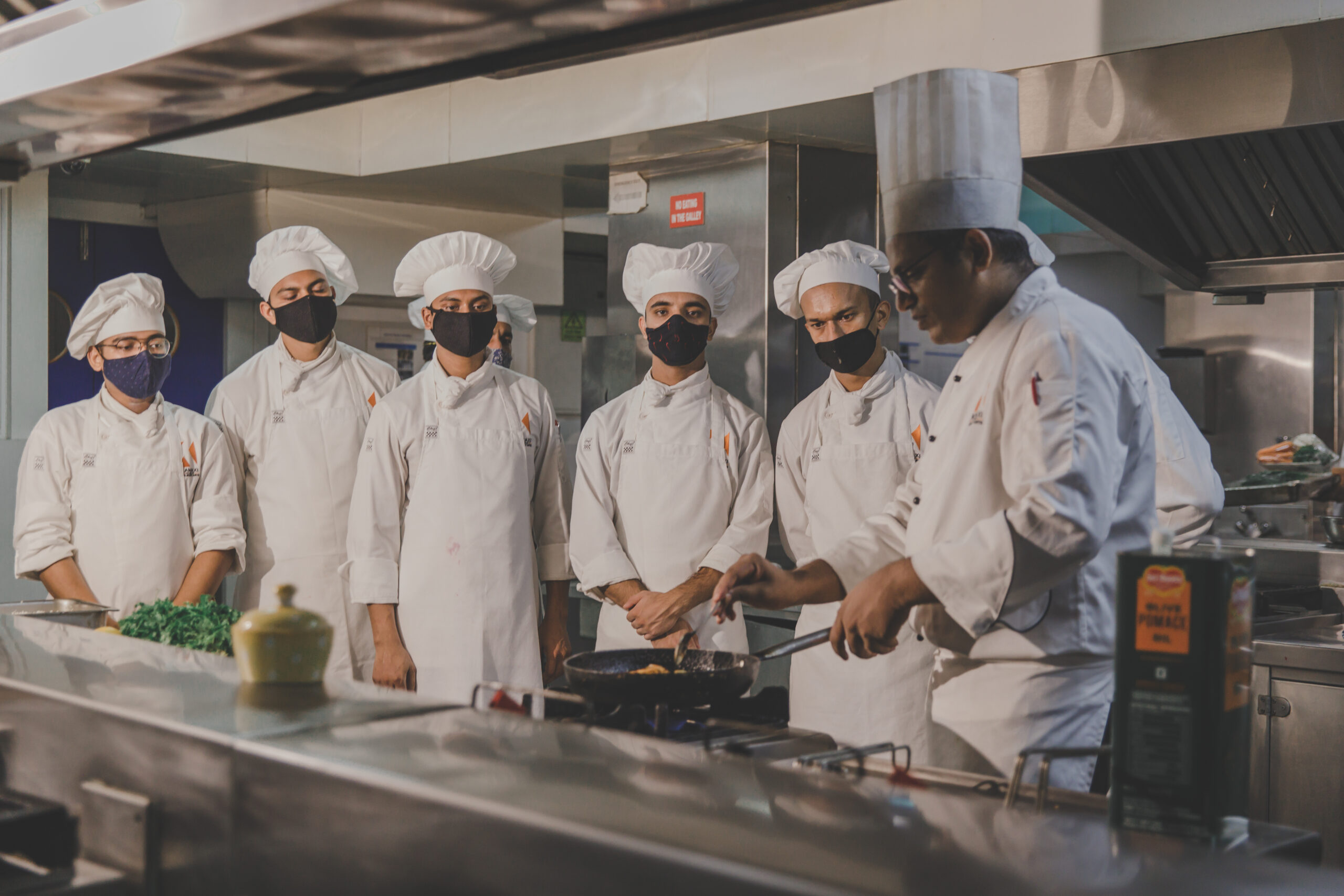 Students of Verna-based Kamaxi College of Culinary Arts, learning the art of cooking to transform their culinary passion into professional careers.